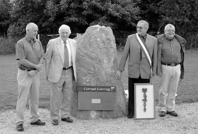 Presentation of the Menhir. Ian Lebbon and Rhys Webb from Carrog and Marcel Le Guern (Mayor) and Marc Parayre (President of the Twinning Committee) from Plouy&eacute;.
